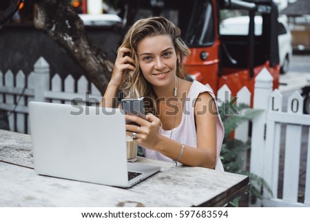 pretty young beauty woman using laptop in cafe, outdoor portrait business woman, hipster style, internet, smartphone, office