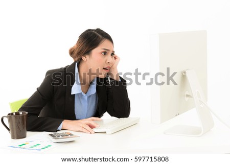 Business woman working in modern office isolated in white background. Typing keyboard with monitor, coffee, calculator for asian, girl, career woman, talent business visual communication concept.