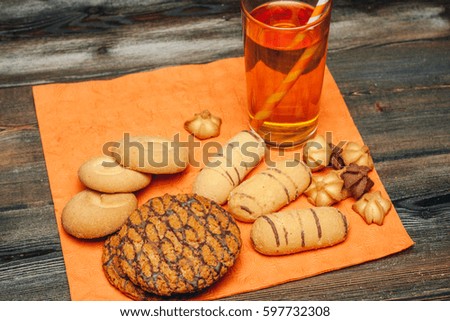 Cookies juice in a glass with a straw