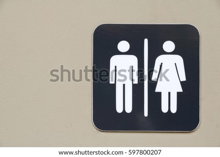 A Symbol of toilet that men or women can use a restroom