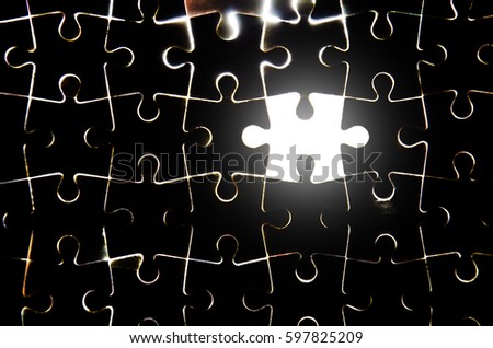 The last missing piece of jigsaw puzzle concept for solution and completion. Concept: cooperation, creativity, teamwork,  and access solution.