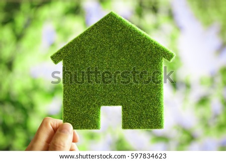 Green eco house environmental background for future residential building plot