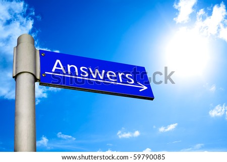 Road sign in front of a blue summer sky showing the way to Answers