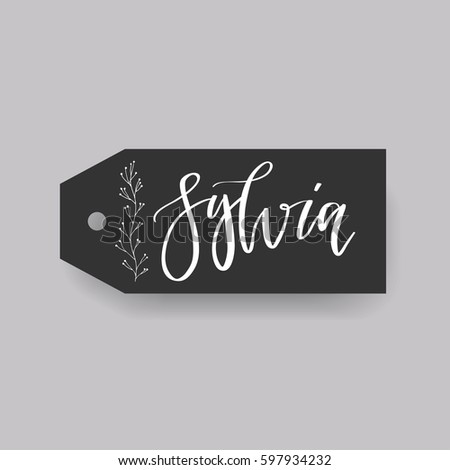 Sylvia - common female first name on a tag, perfect for seating card usage. One of wide collection in modern calligraphy style.