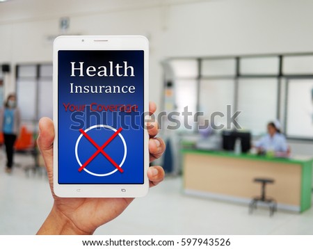 hand holding phone showing phone application Health Insurance NOT Approved , Form Showing Insurance or Medical Application concepts Royalty-Free Stock Photo #597943526