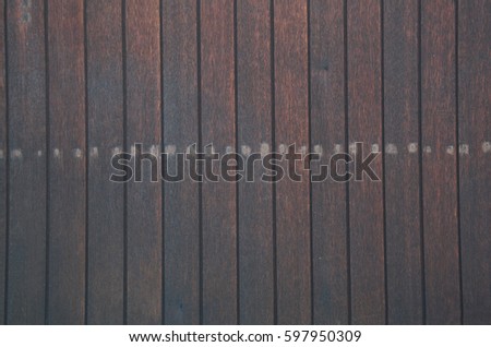 natural wood wall with steel nails background
