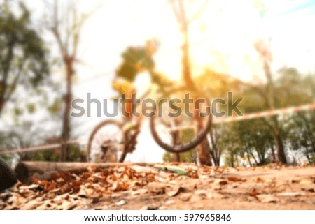 blurred people on bicycle race with morning light sun wheel race competition sport speed