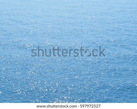 The sea surface with glitter of sunshine 