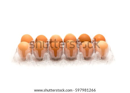 Close-up an open plastic box of a dozen fresh cage free grade A large brown eggs isolated on white background. Top view dozen eggs in cardboard container, paper egg box with clipping path, copy space.