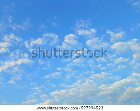 White cloud and blue sky background in sunshine day.