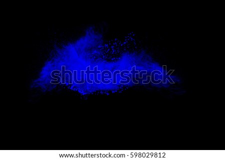 Abstract bright colorful powder on black background. Multicolor clouds. abstract color powder splatted on black background,Freeze motion of color powder exploding and multicolored glitter texture.