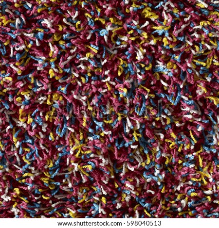 pieces of colored yarn threads background.High-resolution seamless texture