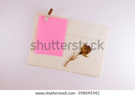 pink short note paper on the envelope with rose vintage style
