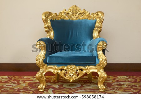 Luxurious vintage green and gold armchair
