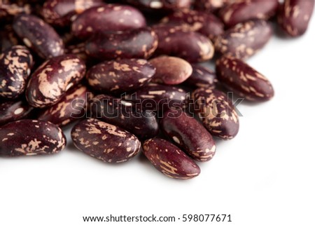 Dark Spotted kidney bean isolated on white background. Dark kidney bean texture background. A large bean with a subtle sweet flavor and soft texture. Beans. Proper nutrition. Vitamins. Healthy food.
