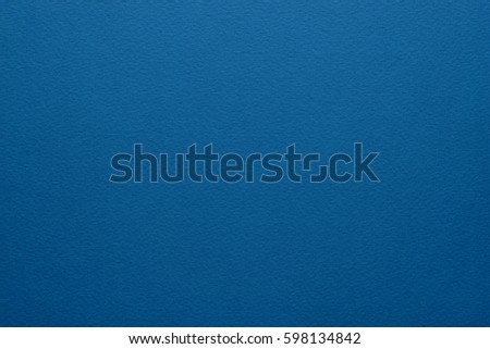 Paper texture background. High quality Grain texture in a high resolution. Deep blue color. Fine arts paper.
