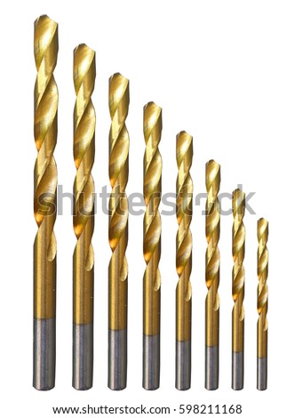 Drill Bits for Metal Set Isolated. Set of spiral drill bits for metal (gold colorured). White background. Royalty-Free Stock Photo #598211168