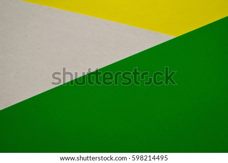 Colored cardboards background in green white yellow tone. Color cardboard. Abstract Colorful Background. Modern material design. The texture of green paper