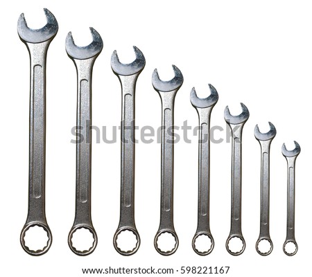Spanner Set Isolated. Silver coloured spanners lying side by side in white background. Royalty-Free Stock Photo #598221167