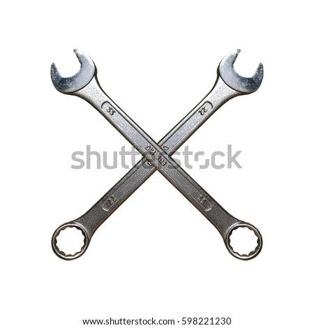 Spanners Crossed. Isolated cross made of two spanner keys. Royalty-Free Stock Photo #598221230