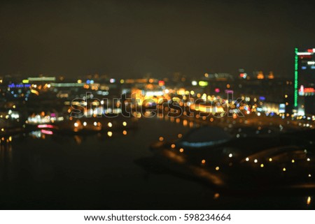 Blurred city lights at night urban background