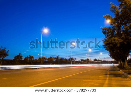the light trails on the street at night. 