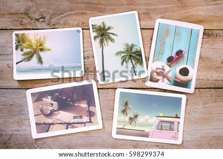 Summer photo album on wood table. Photography from beach vacation - vintage postcards and retro styles Royalty-Free Stock Photo #598299374