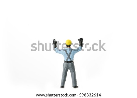 Miniature people engineer worker construction concept on white background with a space for text Royalty-Free Stock Photo #598332614