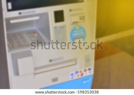 Blurred of ATM machine with soft light