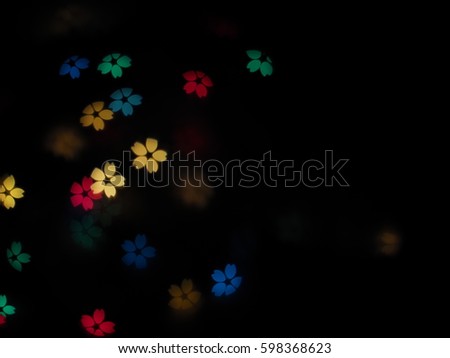 Abstract bokeh blurred color light ,Bokeh art, cheery flower shape, defocused background.