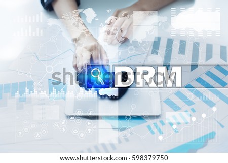 Woman working with documents, tablet pc and selecting drm.