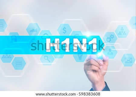 Medical doctor drawing h1n1 on the virtual screen. Royalty-Free Stock Photo #598383608