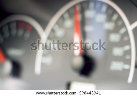 BLURRED photo of the speedometer for the background.