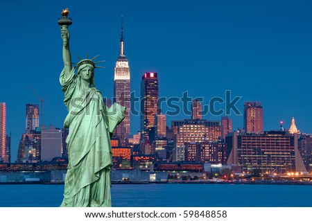 photo tourism concept new york city with statue liberty empire state building. new york skyline at night over hudson river. 