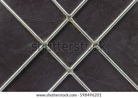 square iron on leather background
