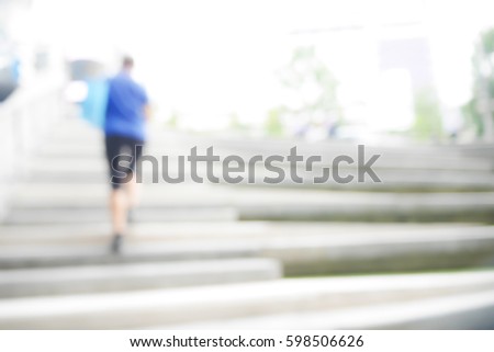 Picture blurred  for background abstract and can be illustration to article of People walk up the ladder