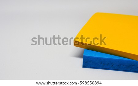 Colorful stack of sticky notes. Macro closeup.