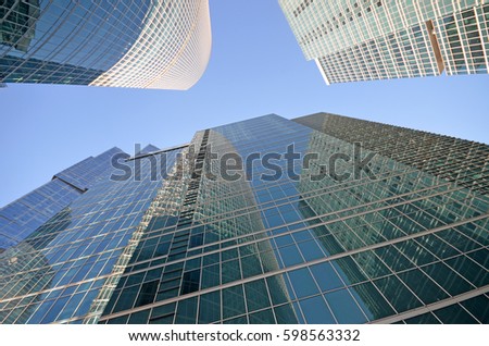 Skyscrapers in a business district on a sunny morning