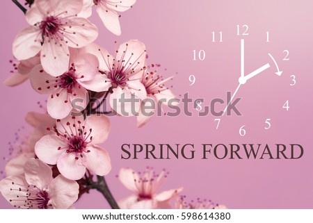 Spring Forward / Daylight Saving Time Begins / Mauve Background Royalty-Free Stock Photo #598614380