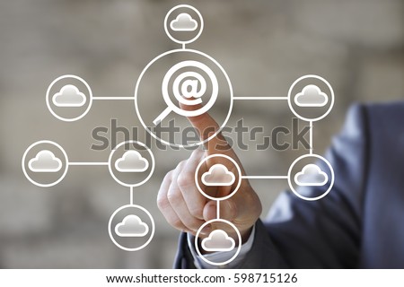 Businessman pressing button search magnifier mail network cloud, concept virtual loupe email
