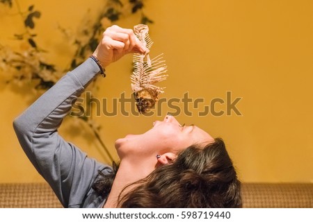 Girl Swallow Fish