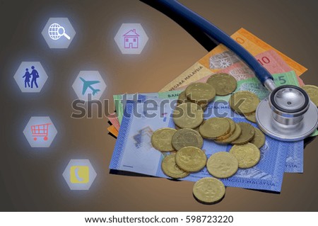 concept with stethoscope, icons and gold coins