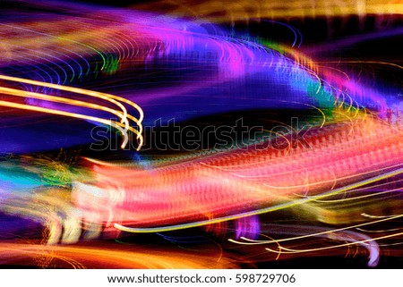 Abstract motion blur messy light trail.Night lights at city.For abstract background.