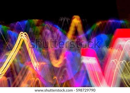 Abstract motion blur messy light trail.Night lights at city.For abstract background.