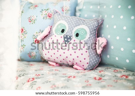 photo of Toy owl on the couch