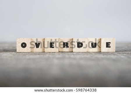 OVERDUE word made with building blocks Royalty-Free Stock Photo #598764338