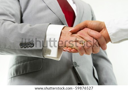 Business handshake of man and woman