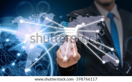 Businessman pointing or touching the shopping icon symbol on earth planet with network line and lens flare over the star background, Internet Network concept, Elements of this image furnished by NASA