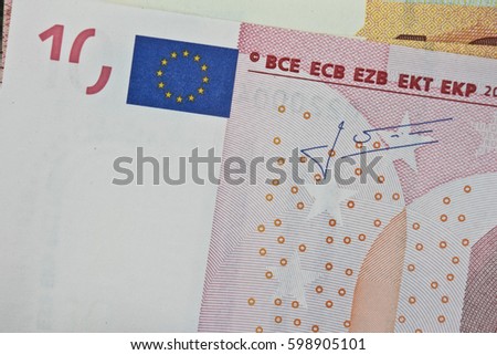 Photo of 10 (ten) EURO banknotes in macro.