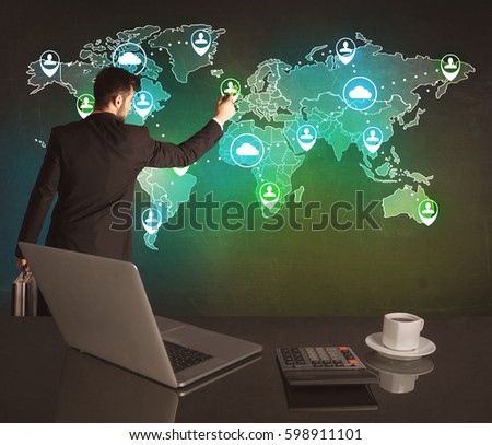A young business manager working on a global sales strategy and drawing on illustrated map of the world concept